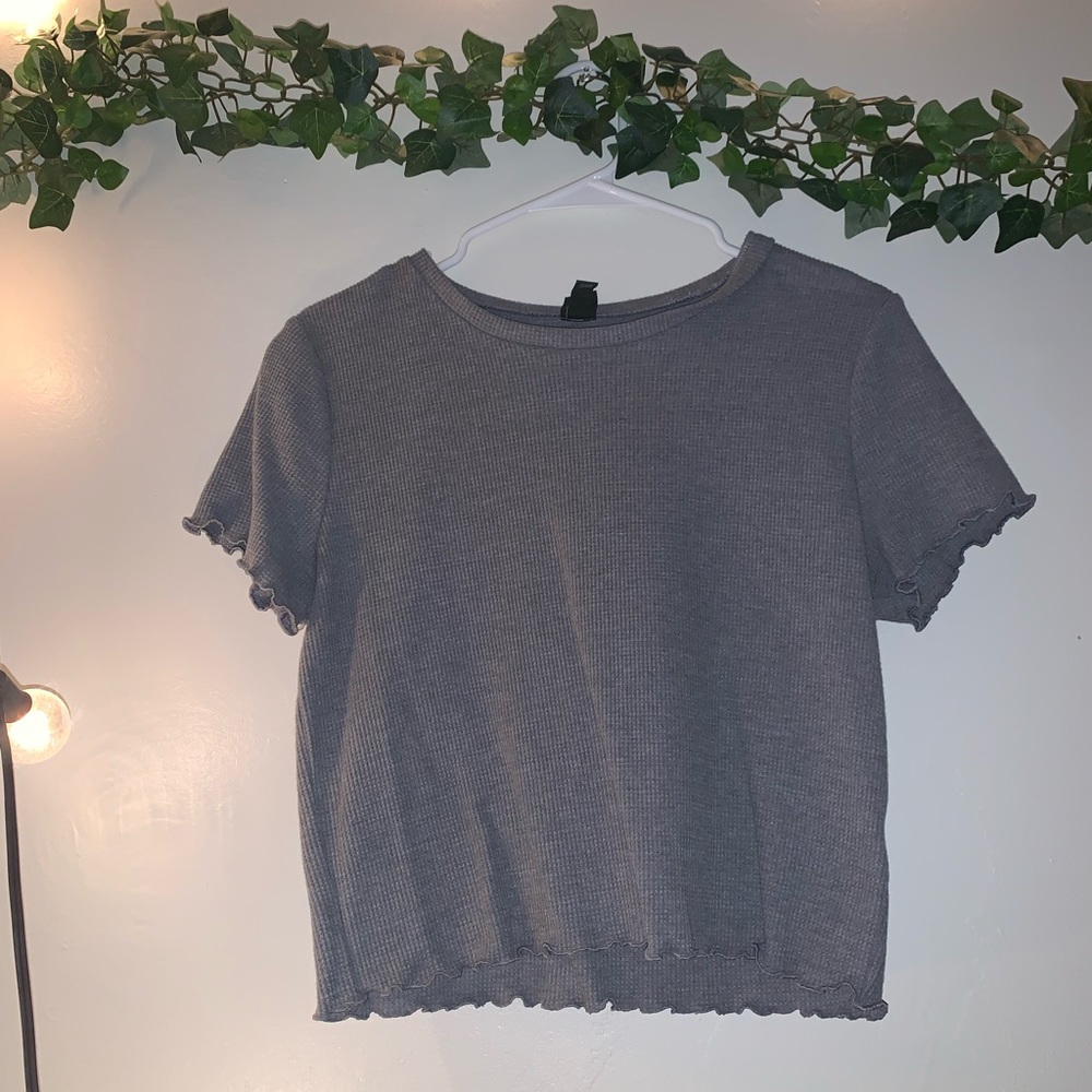 Grey knitted fabric with lettuce cut worn once!